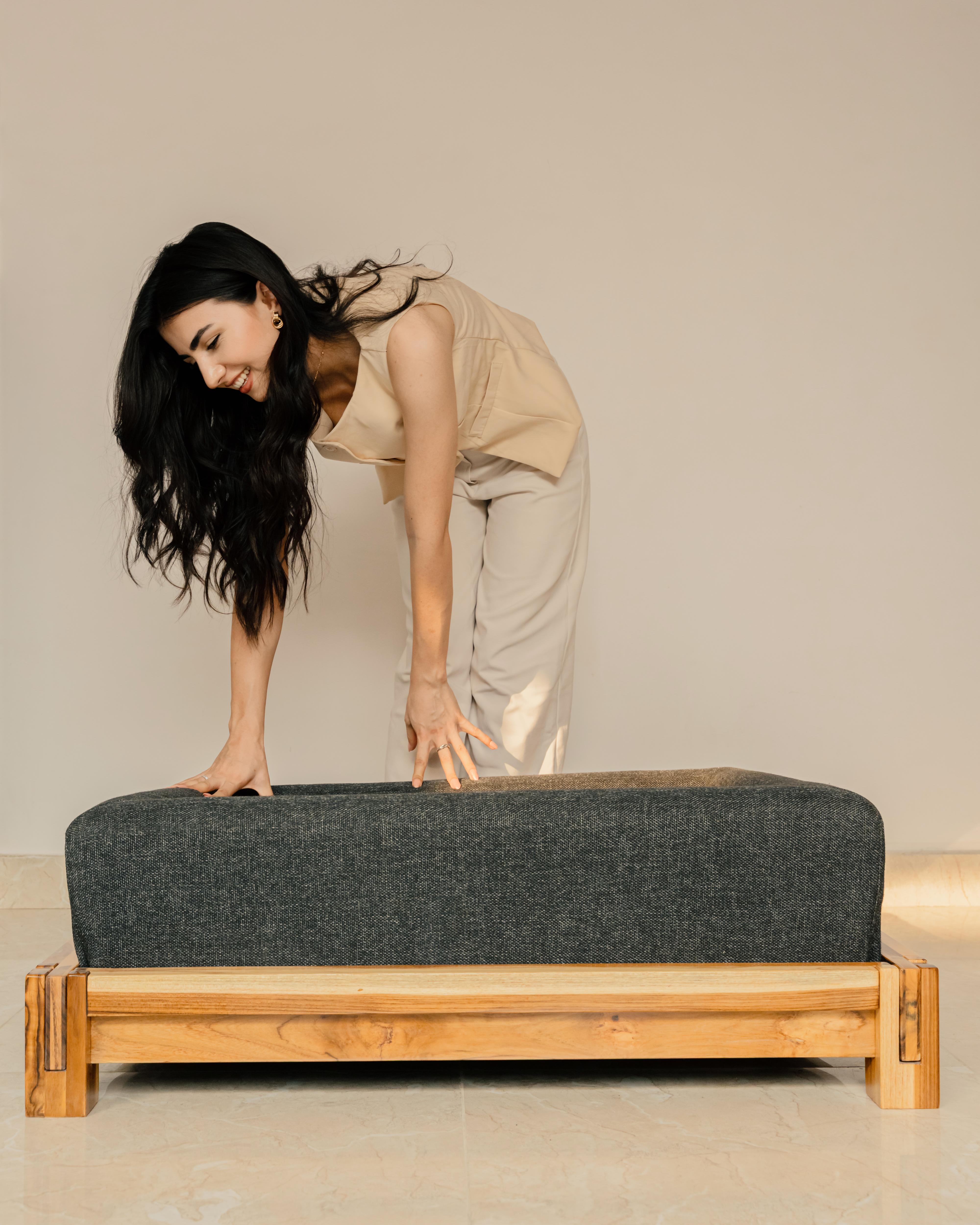 Women adjusting Dog Bed